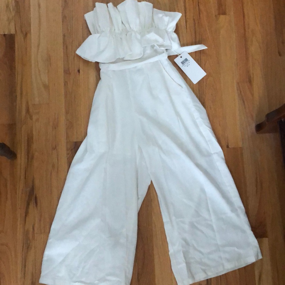 Brand new jumpsuit. Great for a bride